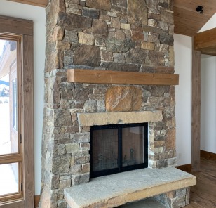 Custom Fireplace with Louisana Moss Rock Mixed with Deep Creek